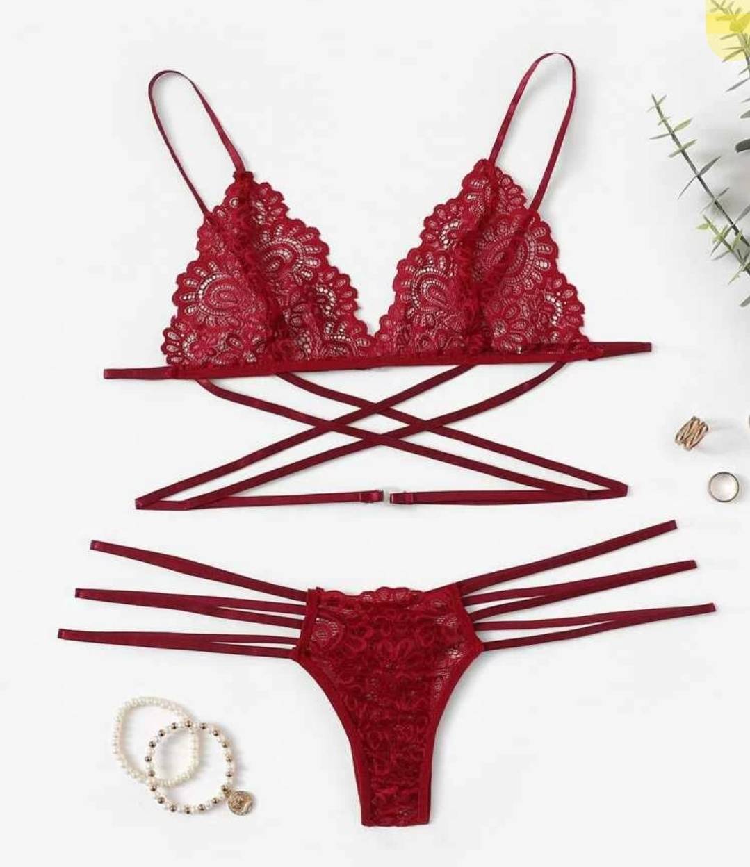 Introducing our Burgundy Criss Cross Ladder Cut-Out Lingerie Set, a tantalizing blend of elegance and allure. This set is a statement piece, adorned with intricate criss-cross detailing and seductive ladder cut-outs that elevate its charm. The rich burgundy hue exudes sophistication, while the delicate lace adds a touch of sensuality. Crafted for both style and comfort, this lingerie set promises a memorable and indulgent experience. Make a lasting impression and embrace the art of seduction with this captivating ensemble.